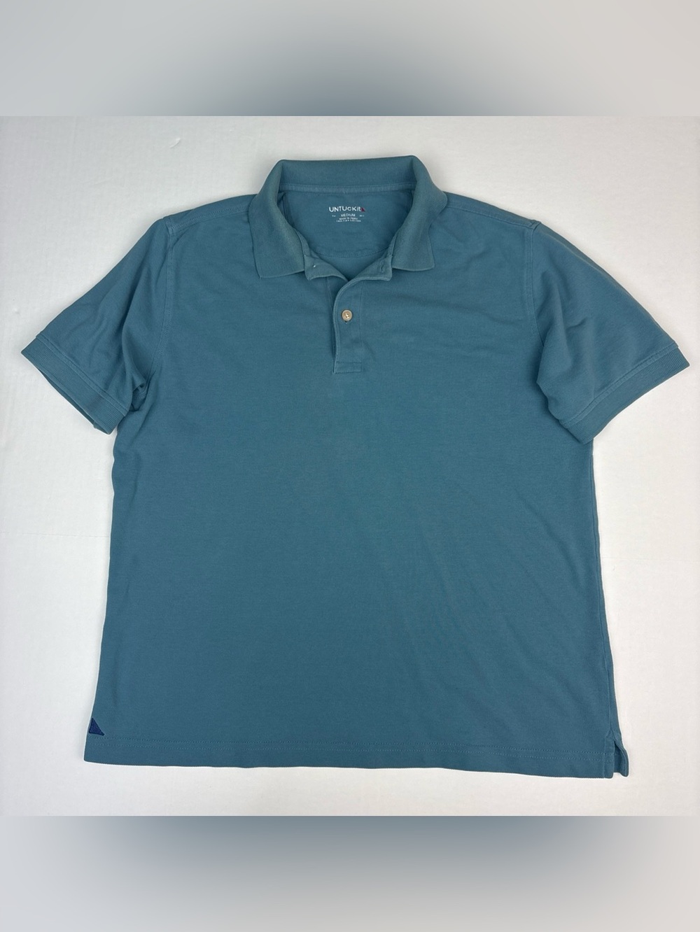 UNTUCKit Men Medium Polo Shirt Blue Short Sleeve Preppy Pima Cotton Flaws Spots